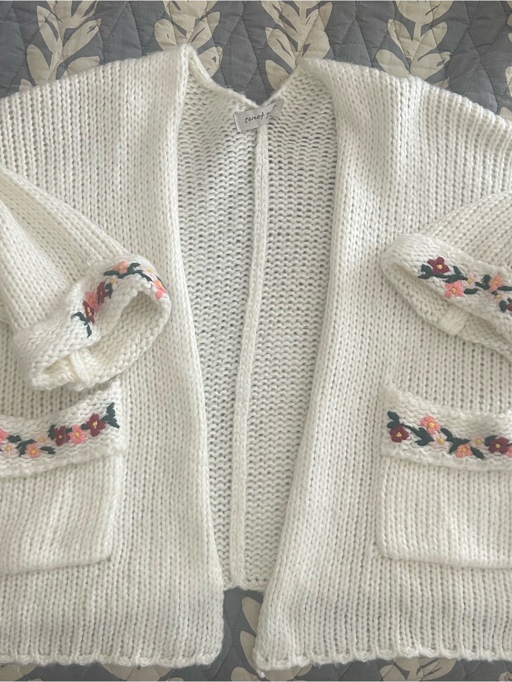 Off White Knit Sweater with Floral Embroidered Pockets
